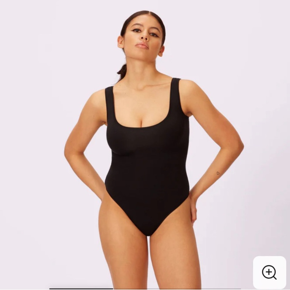 Parade bodysuit. Size medium, black. New without tags. Never worn.